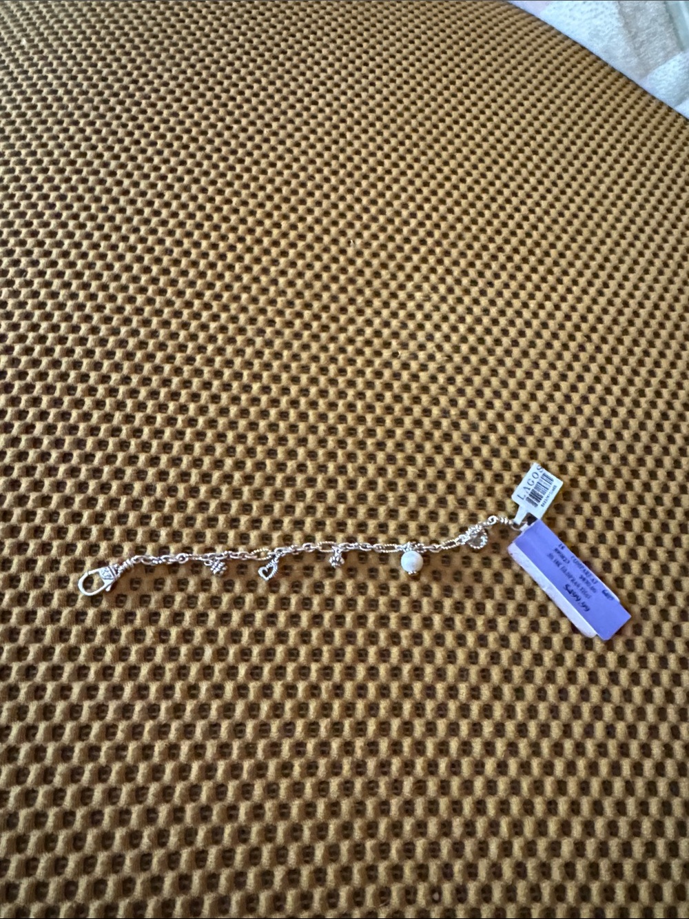 LAGOS Silver Bracelet with gold and pearl accents.